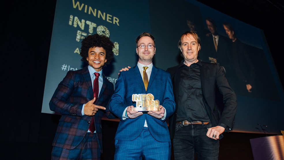 Teacher of the Year winner Rhys Roberts with host Radzi & actor Rhys Ifans