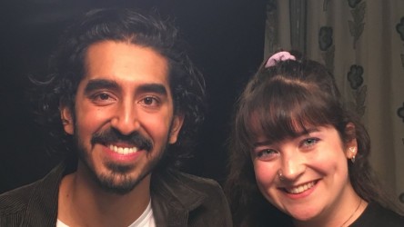 Young Reporter Eleanor with actor Dev Patel